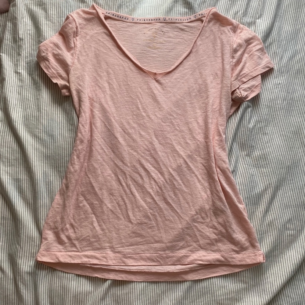 pink v-neck shirt